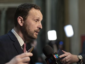 Opposition Leader Ryan Meili speaks to media during budget bay at the Legislative Building in Regina on Wednesday March 20, 2019. Saskatchewan's Opposition NDP leader is apologizing for the Sixties Scoop.THE CANADIAN PRESS/Michael Bell