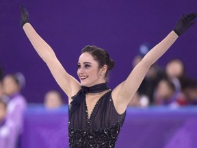 Canada's Kaetlyn Osmond salutes the crowd following her performance in the women's figure skating short program at the Pyeongchang Winter Olympics Wednesday, February 21, 2018 in Gangneung, South Korea. Canada's Kaetlyn Osmond is retiring from competitive figure skating. She won a world title last year in Italy and two Olympic medals at the Pyeongchang Games.