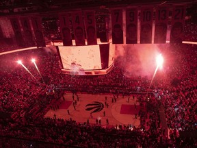 Pyrotechnics illuminate the court before first half NBA Eastern Conference finals action between the Toronto Raptors and the Milwaukee Bucks, in Toronto on Saturday, May 25, 2019. The Toronto Raptors landing in the NBA finals is a historic cause for celebration for many Canadians, but it's put also put damper on plans for some concertgoers.