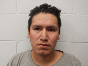 Paul Bruce Harper is shown in this undated police handout photo. Two men and a foster mother have been charged after an investigation found at least 17 children were abused on a Manitoba First Nation. Supt. Michael Koppang of the RCMP says three children on the Garden Hill First Nation alleged they were abused in 2017. Paul Bruce Harper, who is 21, was arrested but officers learned he had access to a foster home and 150 children had contact with him.