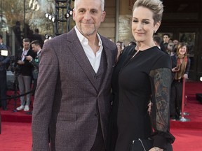Patrick Huard and guest arrive at the Gala Artis awards ceremony in Montreal, Sunday, May 12, 2019. American TV comedy "Brooklyn Nine-Nine" is getting a French-Canadian adaptation that'll reintroduce its characters with a Quebecois spin, according to reports from industry trades Deadline and the Hollywood Reporter.