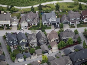 Houses are seen in an aerial view in Langley, B.C., on Wednesday May 16, 2018. Federal parties are floating potential platform ideas to address what appears to be a key concern from voters: Housing affordability.