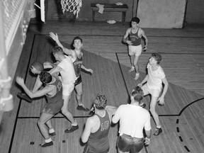 Members of the Toronto Huskies are seen during a practice session at the Central YMCA, in Toronto on Oct. 30, 1946.