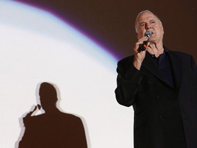 English actor John Cleese poses for photos during a ceremony to receive Sarajevo Film Festival's top honour award, the Heart of Sarajevo Award, in Sarajevo, Bosnia, on August 16, 2017. John Cleese is shopping for an island villa and hopes his Canadian fans might help him finance it. The Monty Python comedian recently settled into a temporary home on the Caribbean island of Nevis, a getaway of beautiful resorts and sandy beaches, and once he can afford it, Cleese says he'll be looking for a more permanent spot in a sunny destination.