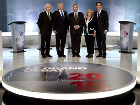 Bloc Quebecois Leader Gilles Duceppe, from left to right, Conservative Leader Stephen Harper, NDP Leader Tom Mulcair, Green party Leader Elizabeth May and Liberal Leader Justin Trudeau pose for photos before the French-language leaders' debate in Montreal on September 24, 2015. Televised leaders' debates during the coming federal election campaign should be more accessible, more civil and more educational for voters trying to make an informed choice. That at least was the advice of some 45 individuals and groups consulted by David Johnston, the former governor general who heads up Canada's first-ever leaders' debates commission.