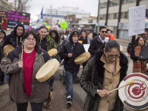 Protesters show their support for Cindy Gladue attend a rally along Edmonton's city streets on Thursday, April 2, 2015. The Supreme Court is to rule today on the case of an Ontario trucker acquitted in the death of an Alberta woman in what could set a precedent in Canada's sexual assault laws.