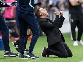 Vancouver Whitecaps head coach Marc Dos Santos celebrates after Vancouver defeated the Portland Timbers 1-0 during an MLS soccer game in Vancouver on Friday May 10, 2019. Midway through the Major League Soccer season and the Vancouver Whitecaps are still desperately searching for scoring.