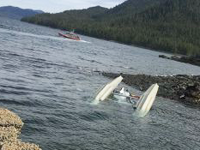 A Coast Guard crew searches for survivors from downed aircraft in the vicinity of George Inlet near Ketchikan, Alaska, May 13, 2019.