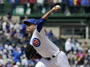 Chicago Cubs starting pitcher Jose Quintana throws against the Milwaukee Brewers during the first inning of a baseball game in Chicago, Friday, May 10, 2019.