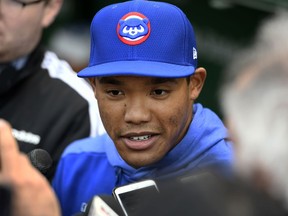 Chicago Cubs shortstop Addison Russell speaks to the media in the dugout before a baseball game against the Miami Marlins, Wednesday, May 8, 2019, in Chicago. Russell rejoins the team after completing a 40-game suspension for violating Major League Baseball's domestic violence policy and spending extra time in the minors to get ready.