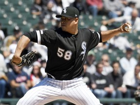 Chicago White Sox starter Manny Banuelos pitches against the Cleveland Indians during the first inning of a baseball game, Tuesday, May 14, 2019, in Chicago.