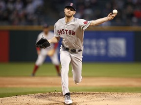 Boston Red Sox starting pitcher Chris Sale delivers during the first inning of a baseball game against the Chicago White in Chicago on Friday, May 3, 2019.
