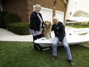 Avid boaters and new Stone and South purchasers Danielle and Andy Roy with Cooper.