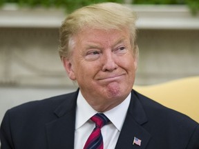 President Donald Trump smiles during a meeting with Slovak Prime Minister Peter Pellegrini in the Oval Office of the White House, Friday, May 3, 2019, in Washington.