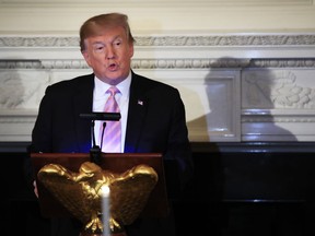 President Donald Trump speaks during a National Day of Prayer dinner gathering in the State Dining Room of the White House in Washington, Wednesday, May 1, 2019.