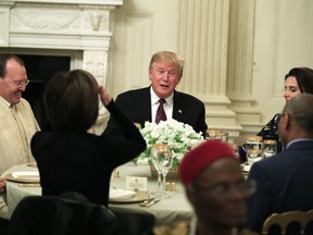 President Donald Trump joins an iftar dinner, which breaks a daylong fast, celebrating Islam's holy month of Ramadan, in the State Dining Room of the White House in Washington, Monday, May 13, 2019.