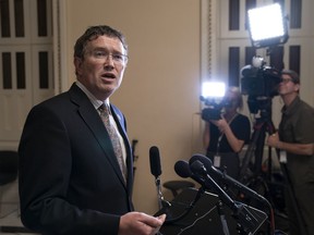 Rep. Thomas Massie, R-Ky., speaks to reporters at the Capitol after he blocked a unanimous consent vote on a long-awaited $19 billion disaster aid bill in the chamber on Tuesday, May 28, 2019.