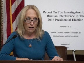 House Judiciary Committee member Rep. Mary Gay Scanlon, D-Pa., begins a complete reading of the report by special counsel Robert Mueller on Russian election interference, at the Capitol in Washington, Thursday, May 16, 2019.