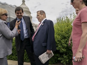 Two people ask to take a photo with House Judiciary Committee Chairman Jerrold Nadler, D-N.Y., center, as the Senate and the House of Representatives shut down for the week-long Memorial Day recess, at the Capitol in Washington, Thursday, May 23, 2019. Rep. Nadler, whose district covers parts of Manhattan and Brooklyn in New York, has gained notoriety by leading one of the House committees investigating President Donald Trump.