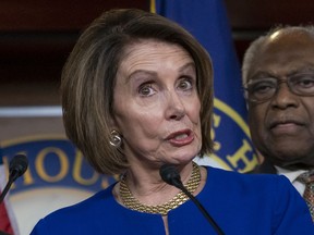 Speaker of the House Nancy Pelosi, D-Calif., joined at right by Majority Whip James E. Clyburn, D-S.C., and other congressional leaders, reacts to a failed meeting with President Donald Trump at the White House on infrastructure, at the Capitol in Washington, Wednesday, May 22, 2019. Trump lashed out at Pelosi after she told reporters earlier in the morning on Capitol Hill she believed the president engaged in a "cover up" of the Russia probe.
