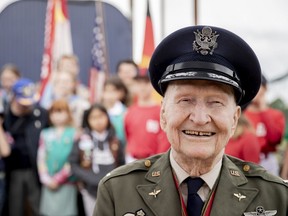 Retired Col. Gail Halvorsen attends a ceremony to dedicate the baseball and softball field of the Berlin Braves baseball team in 'Gail Halvorsen Park' in Berlin , Saturday, May 11, 2019. Halvorsen is known as the "Candy Bomber," "Chocolate Pilot," and "Uncle Wiggly Wings," for the small candy-laden parachutes he dropped from his aircraft to children during the Berlin Airlift of 1948-1949.