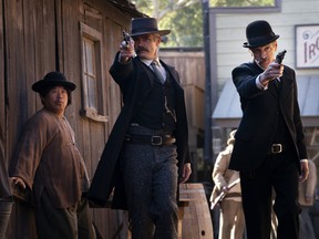 Timothy Olyphant, John Hawkes in Deadwood: The Movie.