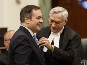 Speaker of the house Robert Wanner puts a pin on Alberta Premier Jason Kenney after being sworn in at the Alberta Legislature in Edmonton on Tuesday, May 21, 2019.