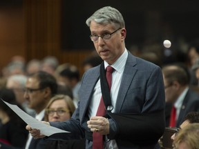 Parliamentary Secretary to the Minister of Foreign Affairs Andrew Leslie rises during Question Period in the House of Commons Thursday April 11, 2019 in Ottawa. A first-time Liberal MP and long-time military man says he won't run for re-election this fall.