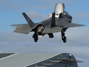 A new F-35B Lightning fighter jet takes off from the deck of the United Kingdom's new aircraft carrier, The HMS Queen Elizabeth, at sea in the Atlantic Ocean on Sept. 27, 2018.