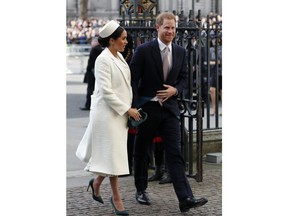 FILE - In this file photo dated Monday, March 11, 2019, Britain's Prince Harry and Meghan Markle, the Duchess of Sussex arrive to attend the Commonwealth Service at Westminster Abbey on Commonwealth Day in London.  Prince Harry on Monday May 6, 2019, said Meghan has given birth to a baby boy.
