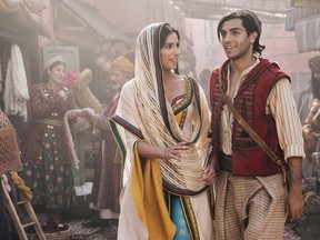 Naomi Scott as Jasmine and Mena Massoud as Aladdin.