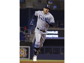 Tampa Bay Rays right fielder Avisail Garcia (24) rounds the bases after hitting a solo home run during the second inning of a baseball game against the Miami Marlins at Marlins Park in Miami, Tuesday, May 14, 2019.