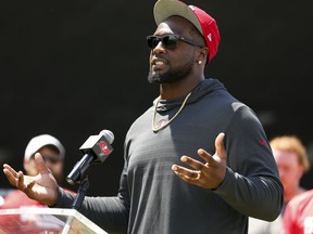 FILE - In this Sept. 18, 2018, gilr photo, Tampa Bay Buccaneers' Gerald McCoy speaks during an announcement of the NFL football team's social justice initiative at the Tampa Police Department Training Academy in Tampa, Fla. The Buccaneers are moving on from Gerald McCoy. The team released the six-time Pro Bowl defensive tackle, describing the move as a mutual agreement after nine seasons.