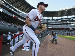 Atlanta Braves outfielder Austin Riley takes the field making his major league debut against the St. Louis Cardinals in a baseball game, Wednesday, May 15, 2019, in Atlanta.