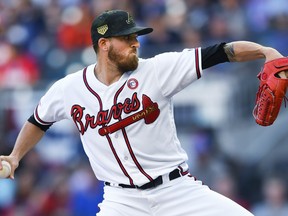 Atlanta Braves' Kevin Gausman pitches against the Milwaukee Brewers during the first inning of a baseball game Saturday, May 18, 2019, in Atlanta.