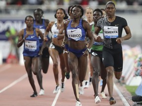 South Africa's Caster Semenya, right, competes to win the gold in the women's 800-meter final during the Diamond League in Doha, Qatar, Friday, May 3, 2019.