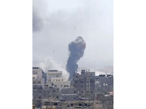 Israeli airstrike hits Gaza City, Saturday, May 4, 2019. Palestinian militants in the Gaza Strip fired at least 90 rockets into southern Israel on Saturday, according to the Israeli military, triggering retaliatory airstrikes and tank fire against militant targets in the blockaded enclave and shattering a month-long lull in violence.