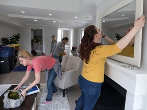 Stagers from Red House Staging and Interiors prepare a home for sale in the District of Columbia.