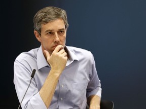 Democratic presidential candidate and former Texas Congressman Beto O'Rourke listens to a speaker during a roundtable discussion on climate change, Monday, May 6, 2019, in Des Moines, Iowa.