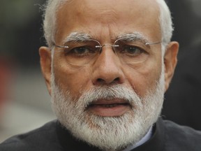 FILE- A Dec. 11, 2018 file photo of Indian Prime Minister Narendra Modi in New Delhi, India. Modi has been skewered by the opposition for going ahead with an airstrike in Pakistan on the mistaken belief that cloudy skies would help India's air force avoid radar detection over experts' advice to delay the operation until the weather cleared. In a television interview, Modi said he used his "raw wisdom" in the operation, believing Indian air force aircraft would benefit from the cloud cover.
