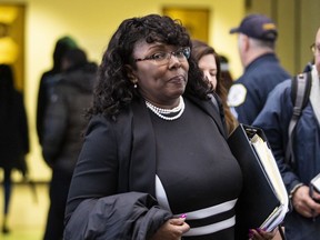 CORRECTS SPELLING OF CATHY AND JUSSIE - Assistant State's Attorney Cathy McNeil-Stein walks out of the Leighton Criminal Courthouse in Chicago after a hearing about appointing a special prosecutor to investigate the Cook County State's Attorney's office handling of "Empire" actor Jussie Smollett's case, Thursday, May 2, 2019.