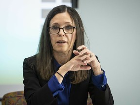 In this May 13, 2019 photo, Dana Weiner, policy fellow at Chapin Hall at the University of Chicago, discusses a review of the Illinois Department of Children and Family Services' Intact Family Services program, during a press event at DCFS, in Chicago. A study released Wednesday, May 15, 2019, has found that Illinois' child welfare agency is so intent on keeping children with their parents and not putting them in foster care despite strong indications that they've been physically abused or neglected that it has put those children in greater danger.