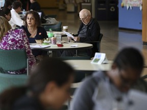 Student Bob Dwyer, 90, studies his notes for a final exam in the common area during a break at Northeastern Illinois University, Wednesday, April 24, 2019. Dwyer will make history Monday when he graduates from Northeastern Illinois University, becoming the school's oldest student to receive his bachelor's degree since the school started keeping such records in 1962.