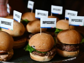 The Impossible Burger 2.0, the new and improved version of the company's plant-based vegan burger that tastes like real beef is introduced at a press event during CES 2019 in Las Vegas, Nevada on January 7, 2019.