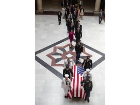 A military honor guard escorts the casket of Sen. Richard Lugar into the Indiana Statehouse in Indianapolis, Tuesday, May 14, 2019. Lugar was a longtime Republican senator and former Indianapolis mayor who's been hailed as an "American statesman" since he died April 28 at age 87.