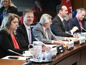 Liberal MPs Sherry Romanado, Sven Spengemann, Yves Robillard, Mark Gerretsen and Darren Fisher wait for the start of the Standing Committee on National Defence, Sherry on Parliament Hill in Ottawa on Thursday, May 16, 2019. The meeting was requested by four members to undertake a study of the government's conduct in the investigation and prosecution of Vice-Admiral Mark Norman.