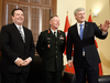 Defence Minister Jason Kenney, Lt.-Gen. Jonathan Vance, and Prime Minister Stephen Harper in Ottawa on April 27, 2015.