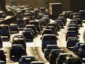 FILE - In this Nov. 15, 2016, file photo morning rush hour traffic moves along the southbound lanes along US 101 near downtown Los Angeles. New population estimates show California's births fell by 18,000 last year, prompting the slowest recorded growth rate in the country's most populous state.
