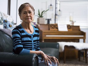 In this Friday, March 1, 2019 photo, Normita Lim poses for a photograph at her home in Concord, Calif. Lim did not receive back pay from her former employer, Publico, who paid her $2 an hour. Residential senior care homes are treating workers as indentured servants – and profiting handsomely. The profit margins can be huge and, for violators of labor laws, hinge on the widespread exploitation of thousands of caretakers, many of them poor immigrants effectively earning $2 to $3.50 an hour to work around the clock.