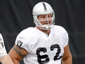 FILE - This July 28, 2007, file photo shows then Oakland Raiders center, Jeremy Newberry during workouts at the team's training camp in Napa, Calif. Newberry says, Sunday, May 19, 2019, vandals have destroyed nearly half of the 4,000 cherry trees recently planted at his Northern California orchard.